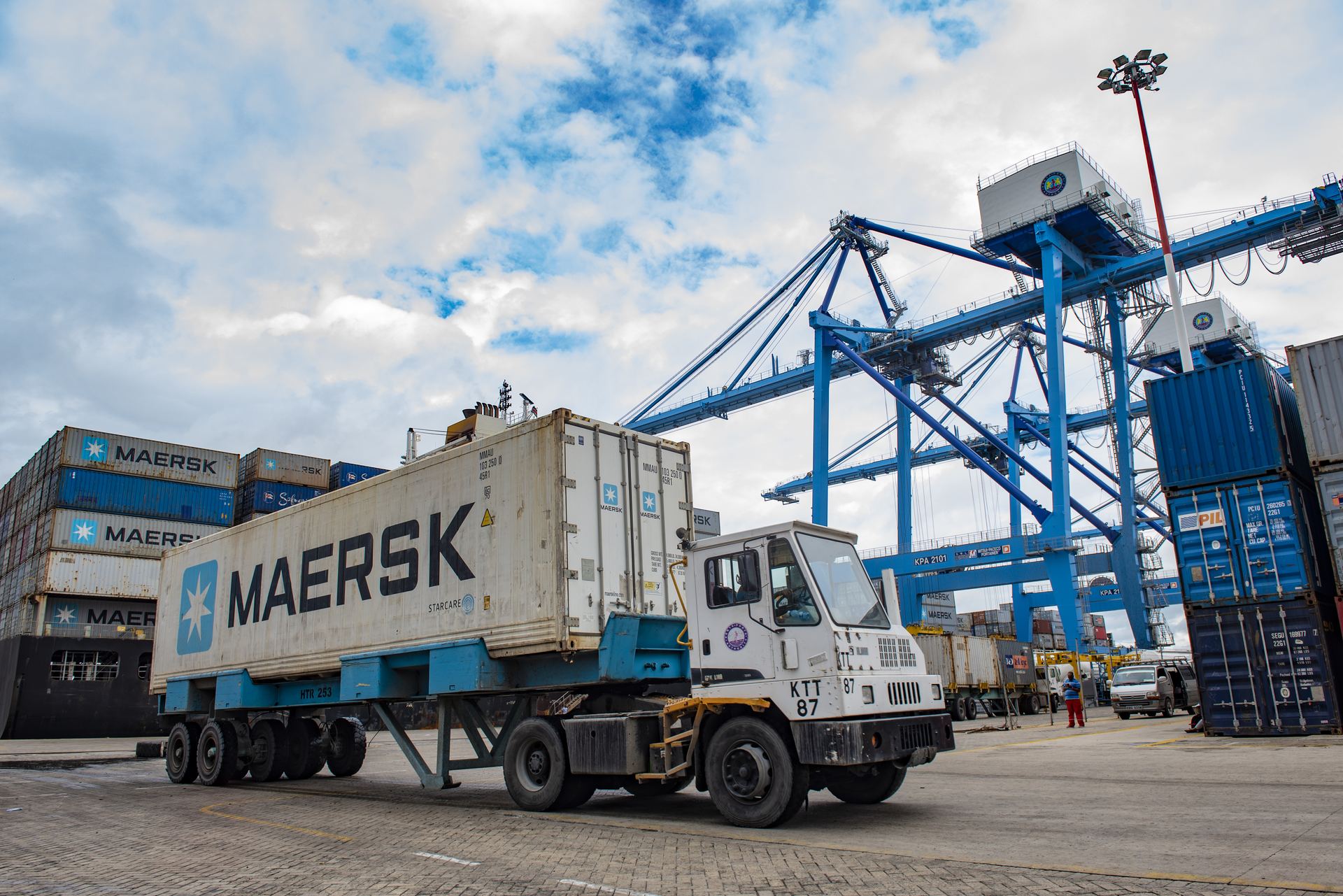 Container truck moving cargo at the port terminal