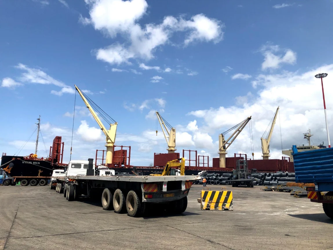 Flatbed trailer loading cargo at the port